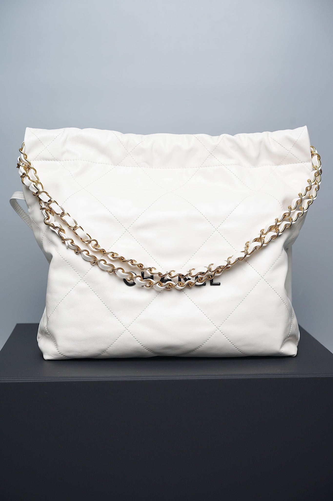 Chanel 22 in White Calfskin with Black Enamel Ghw