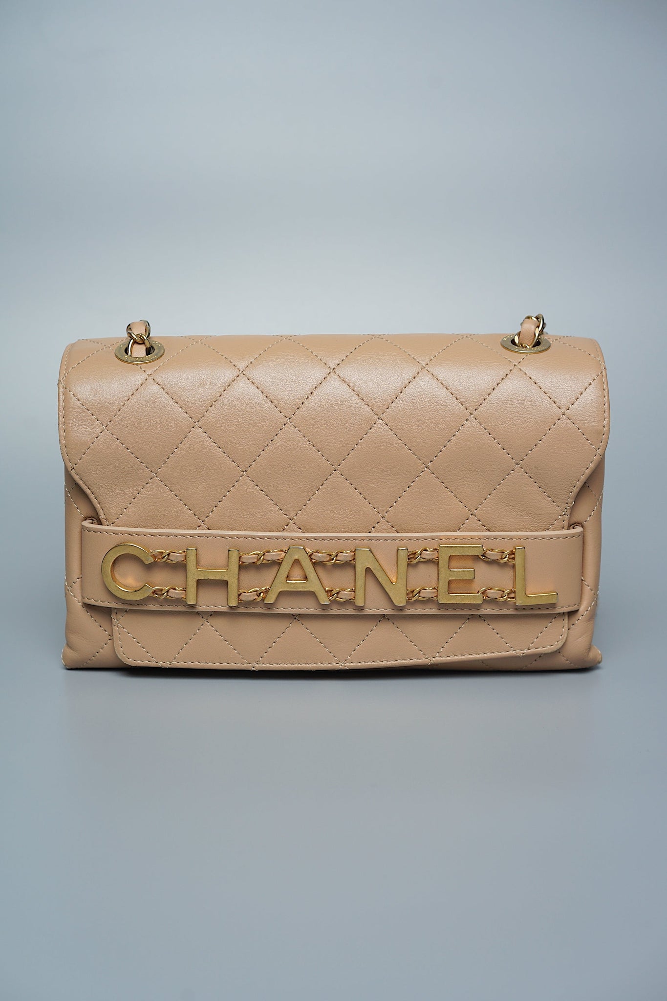 Chanel Logo Quilted Flap in Dark Beige Ghw