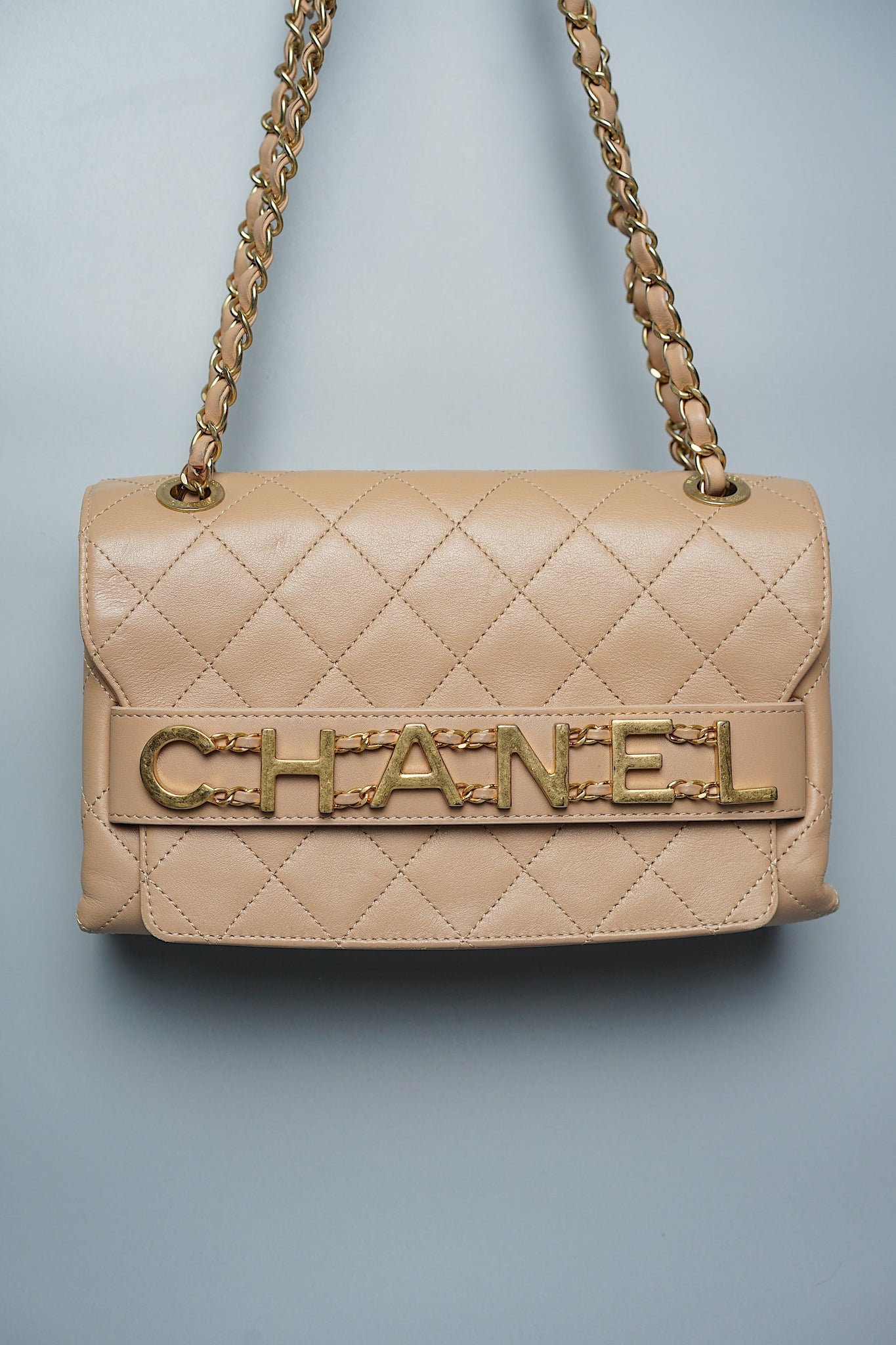 Chanel Logo Quilted Flap in Dark Beige Ghw