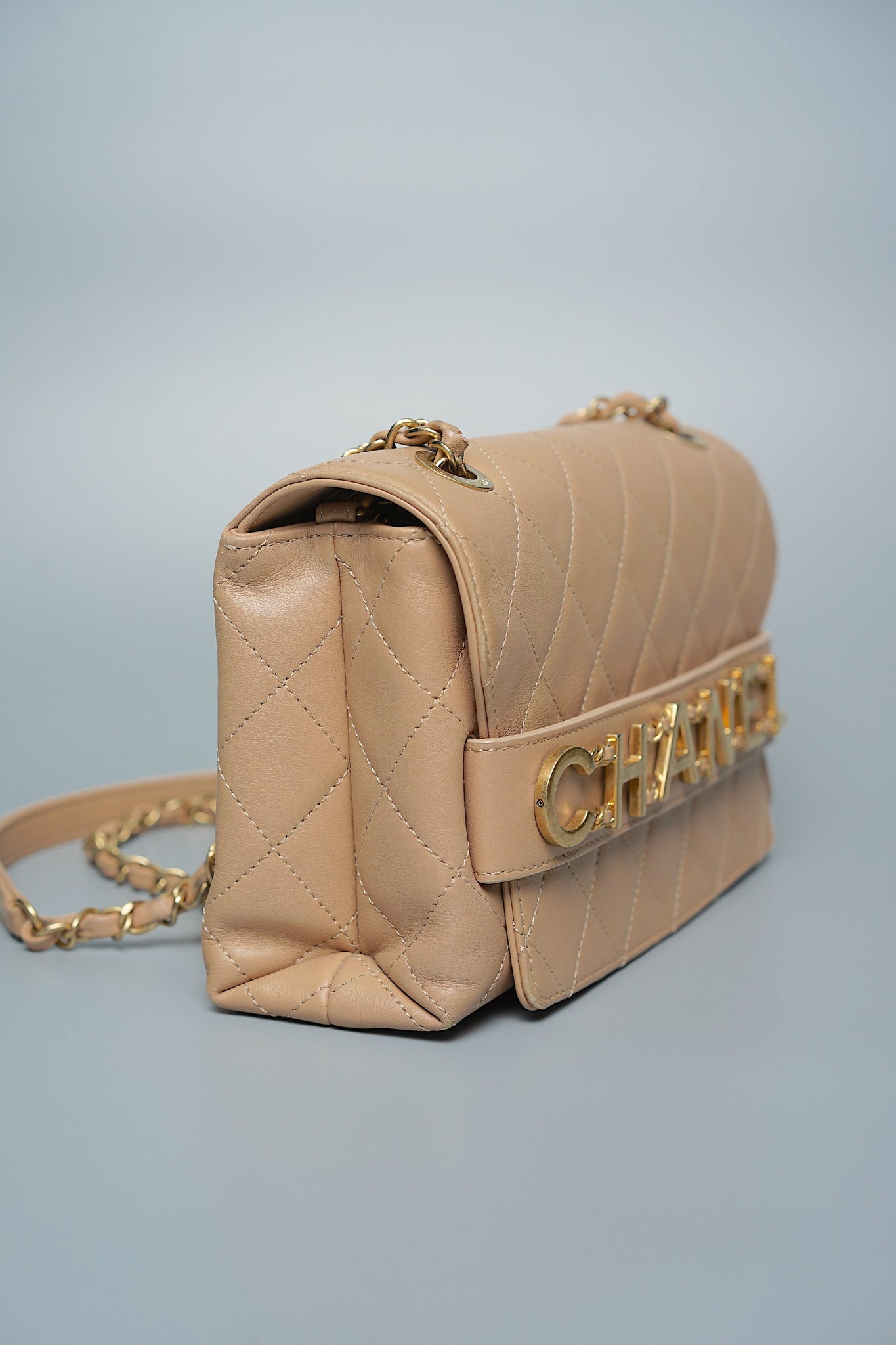 Chanel Logo Quilted Flap in Dark Beige Ghw