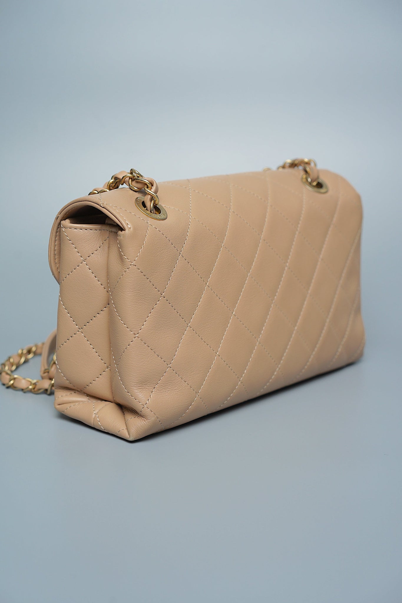 Chanel Logo Quilted Flap in Dark Beige Ghw