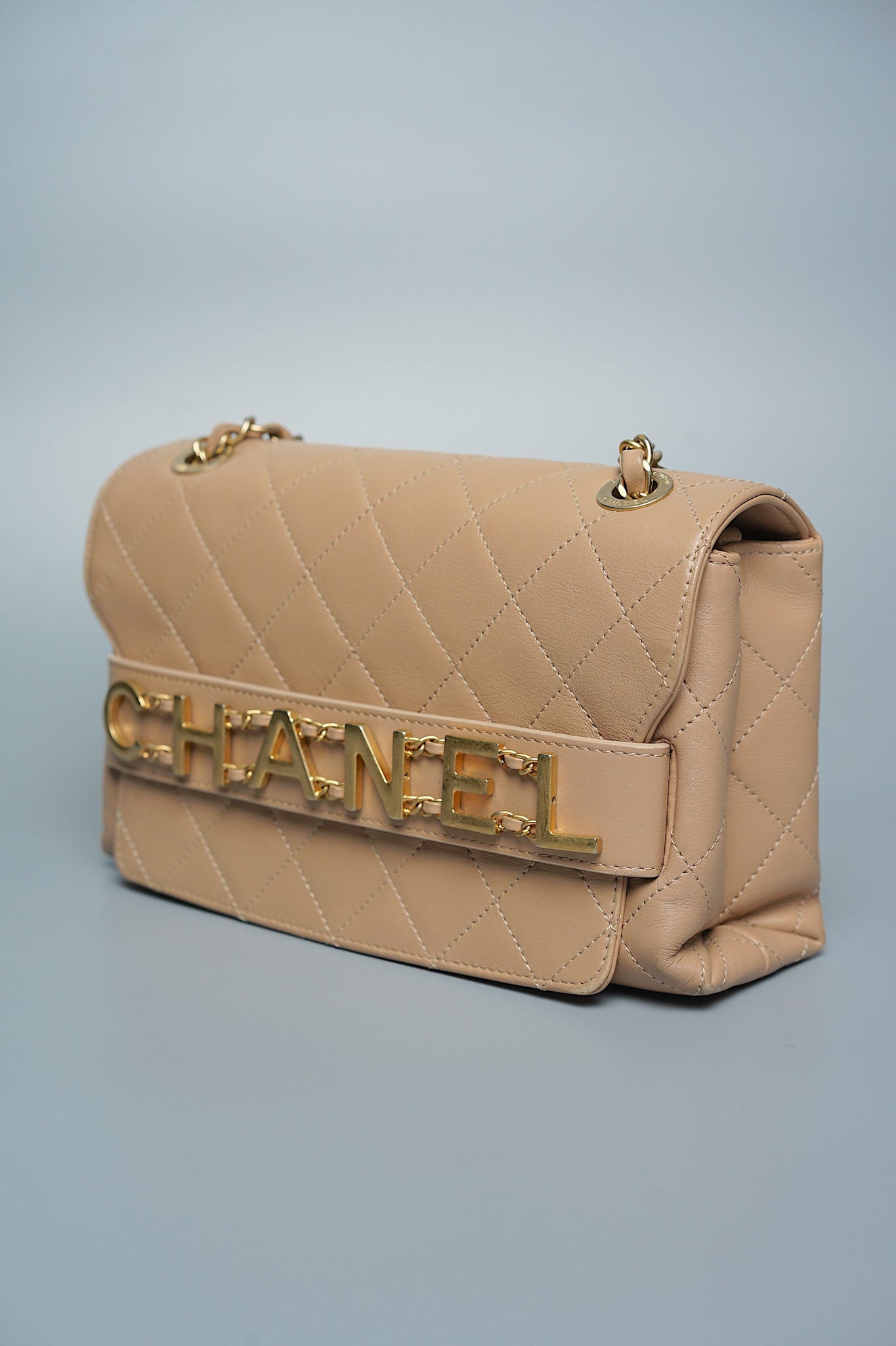 Chanel Logo Quilted Flap in Dark Beige Ghw