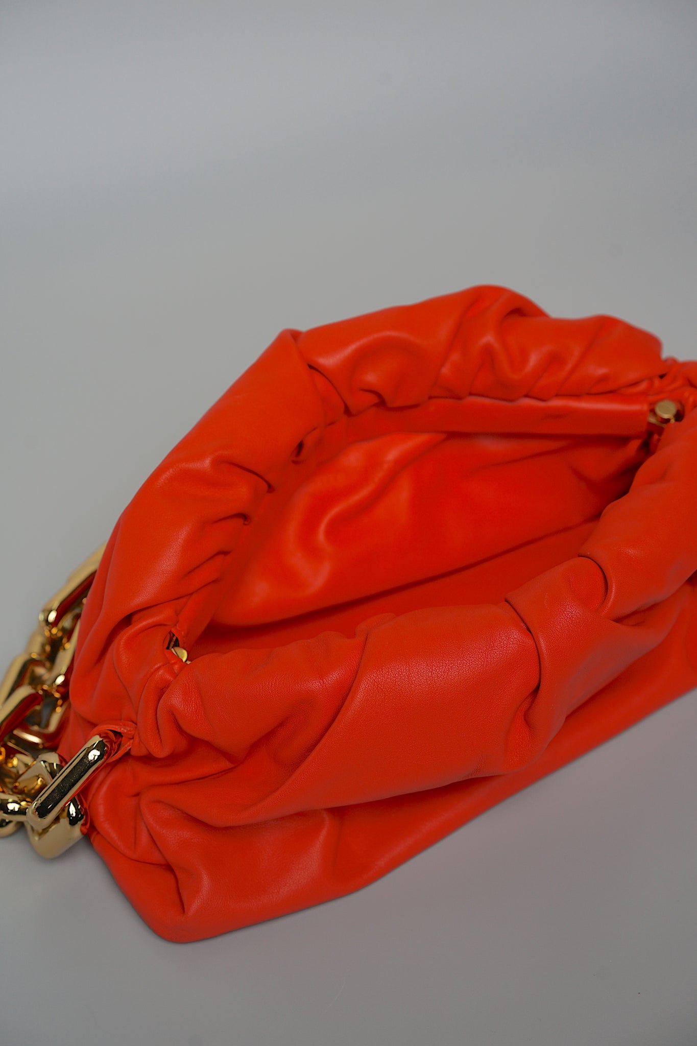 Bottega Chain Pouch Handbag in Orange