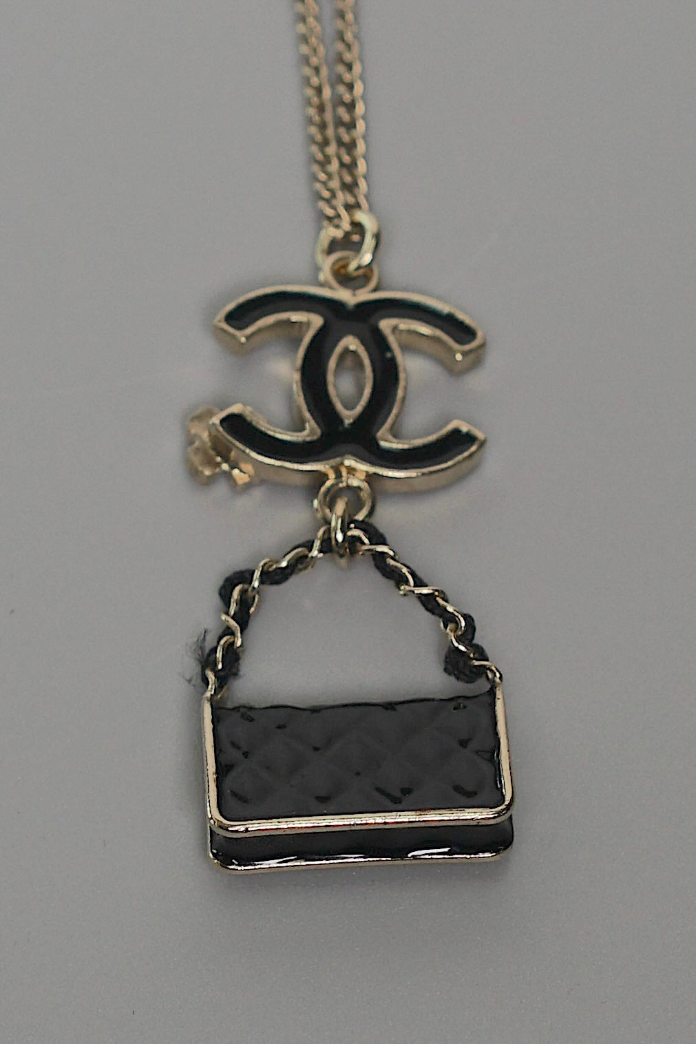 Chanel CC Bag Charm Necklace in Black Gold