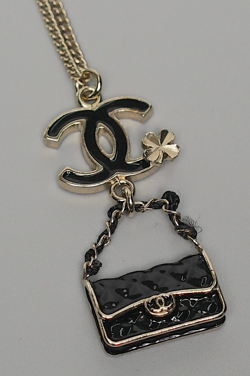 Chanel CC Bag Charm Necklace in Black Gold