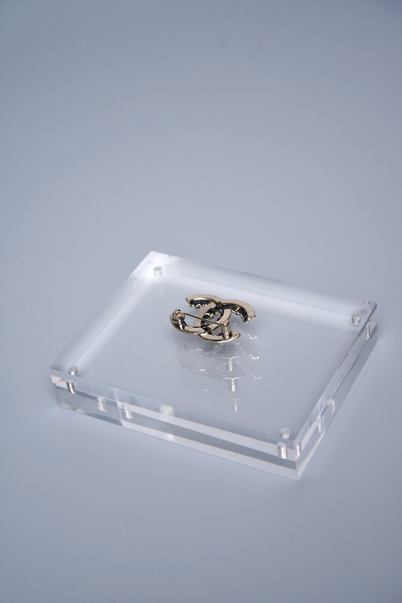 Chanel CC Logo Brooch Pin in Champagne Black